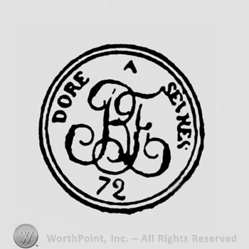 Dore A Sevres written arched above letters RF joined in monogram above number 72; all inside a circle