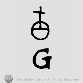Image of cross and orb above letter G written