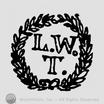LW written above letter T,inside of a wreath