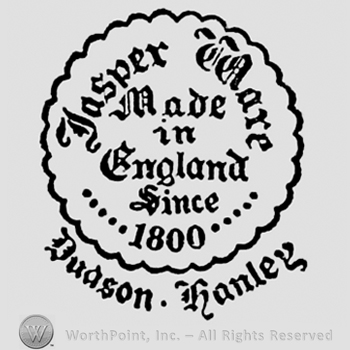 Newspaper font writing inside a circular panel: Jasper Ware, Made in England Since 1800. Dudson. Hanley written below