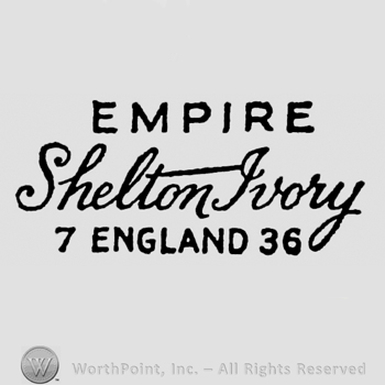 Empire capital written above. Shelton Ivory handwritten below. 7 England 36 written on the bottom