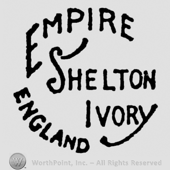 Stylish writings forming a circular form: Empire Shelton Ivory England