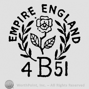 Empire England curved written on top. Flower surrounded by two branches of laurels. 4 B 51 written below