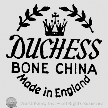 Crown between two laurel branches. Duchess large and italic written above capital writing Bone China, in the centre. Made in England curved written below
