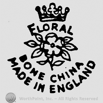 Crown on top. Floral written below. Image of a flower in the centre. Bone China Made in England curved written on two rows beneath