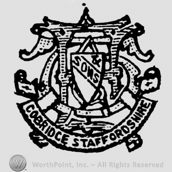 Monogram of initials with a curved frame at the bottom with the inscription: Cobridge Staffordshire. Shield over the monogram with inscription: & Sons