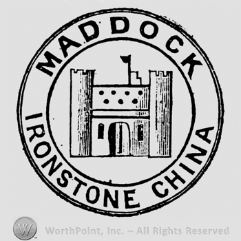 Design on circular panel. Castle in the centre. Maddock above, on the border, Ironstone China below, on the border