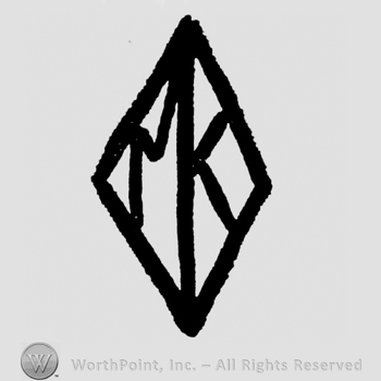 Monogram of MK inside a diamond