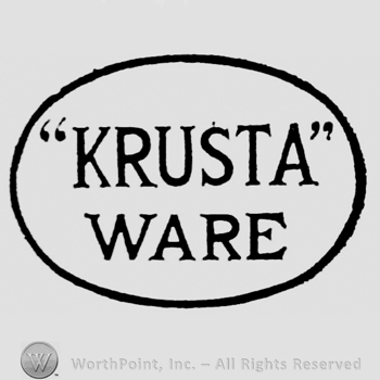 Krusta capital written between quotation marks. Ware written below, inside oval