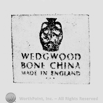 Pot above Wedgood Bone China Made in England capital written