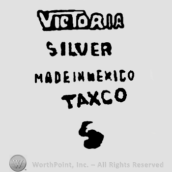Victoria Silver Made in Mexico Taxco written with uppercase letters over number 5