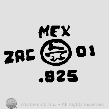Uppercase MEX over a circle with a hammer over an anvil inside, uppercase ZAC to the left, number 01 to the right, number 025 written below