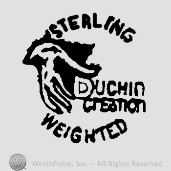 Sterling Duchin Creation Weighted written with uppercase letters and a hand