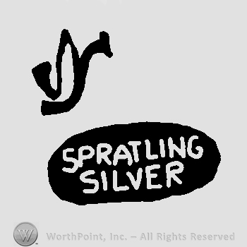 Uppercase handwritten WS over Spratling Silver written with uppercase letters inside an oval