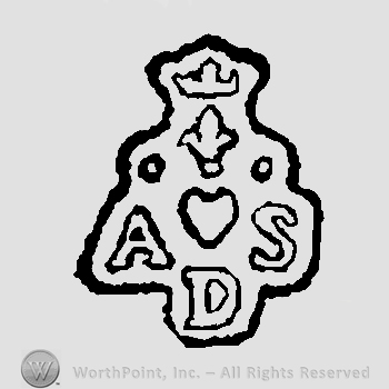 Uppercase letters ASD and heart under two white pearls and fleur de lis all under a crown