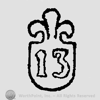 Fleur de lis above number 13