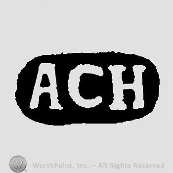 Initials A C H inside oval black frame