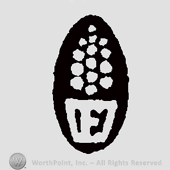 Initial E inside square, below dots in shape of pine cone, inside black oval