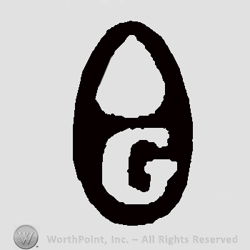 Initial G below teardrop, inside black oval