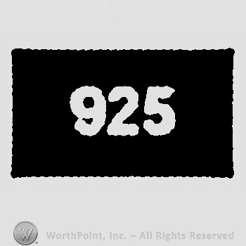 Black rectangle with 925 written on.