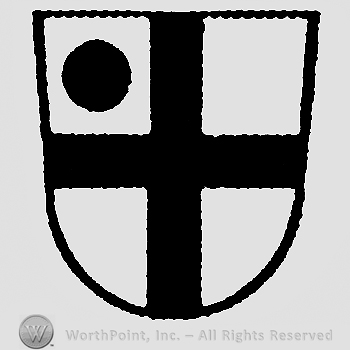 Shield with a cross and a point on.