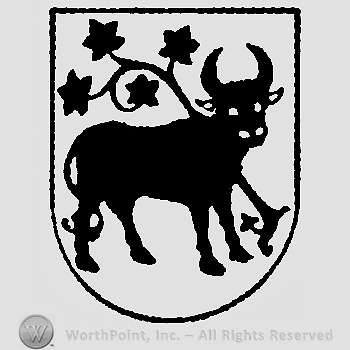 Shield with a cow and a flower.
