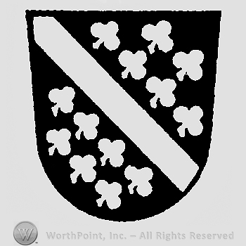 Shield with a line on diagonal and clovers.
