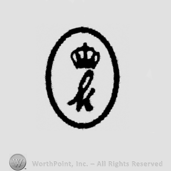 Circle enclosing stylish letter k with a crown.