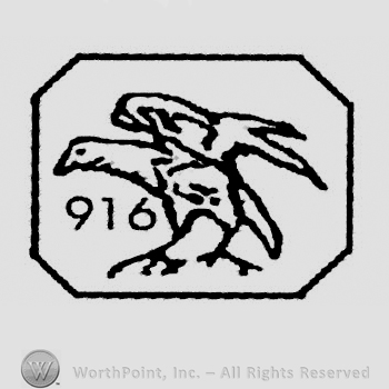 Hexagon with an eagle and 916 written on the left.