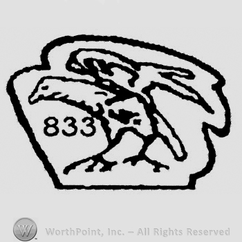 Hexagon with an eagle and 833 written on the left.