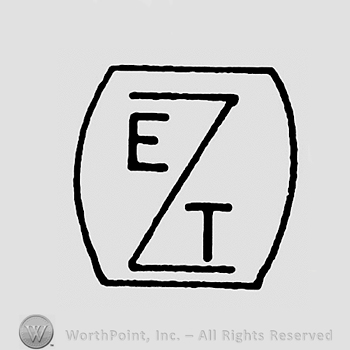 Initials EZT with an enlarged Z on a barrel shaped plate
