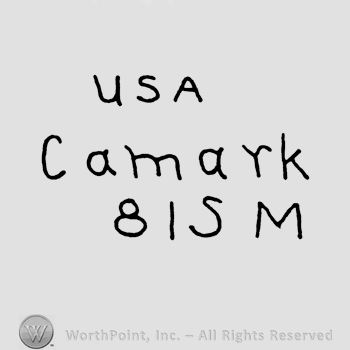 The text USA Camark  written above number 81 and uppercase letters SM.