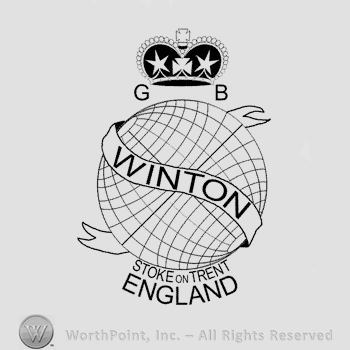 A crown with two stars inside and cross above and letters G and B on sides over a globe with a ribbon on which is read Winton in uppercase letters, the text Stoke on Trent England written in uppercase letters below.