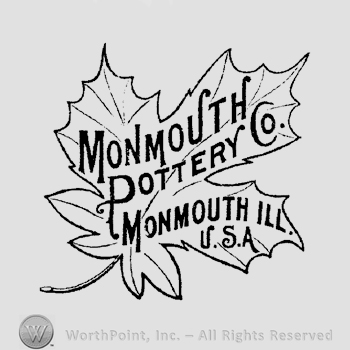 A leaf with the text Monmouth Pottery Co. Monmouth ILL. USA written on it in uppercase letters.