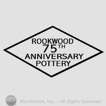 The text Rookwood 75th Anniversary Pottery written in uppercase letters inside a diamond-shaped design.