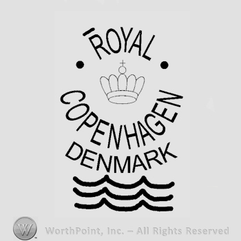 A crown in the center, the text Royal Copenhagen Denmark written around it in uppercase letters and three waved lines below; letter R from Royal has a horizontal line above.