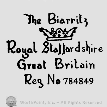 The text The Biarritz Royal Staffordshire Great Britain Reg. No. 784849 written in lowercase letters and the image of a crown.