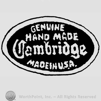 An oval with the text Genuine Hand Made Cambridge Made in USA written inside in uppercase letters.