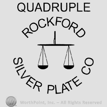 A scale with the text Quadruple Rockford Silver Plate Co. written in uppercase letters.