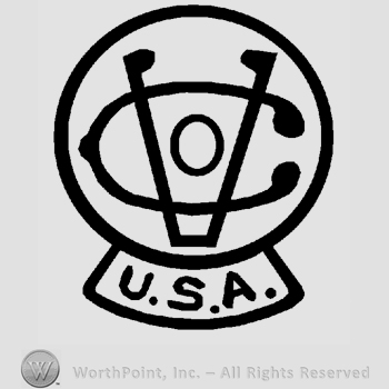 Letter V over letters Co inside a circle, USA written below on the stand of the circle.