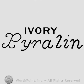 The word Ivory written in uppercase letter over the word Pyralin, handwritten.