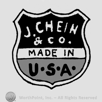 The text J. Chein & Co. Made in USA written in uppercase letters on a shield.