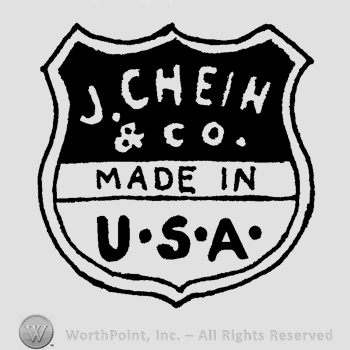 The text J. Chein & Co. Made in USA written in uppercase letters on a shield.