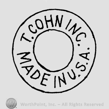 A double-lined circle with the text T. Cohn Inc. Made in U.S.A. written in uppercase letters.