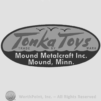 The name Tonka Toys written with a seaside scenery in the background, the text Mound Metalcraft Inc. Mound, Minn. written below in uppercase letters, all inside an oval design.