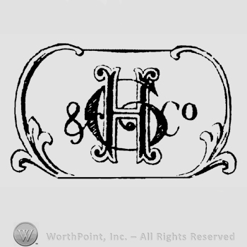 Letters GH & Co., handwritten, entwined, all inside an ornamented rectangular design.