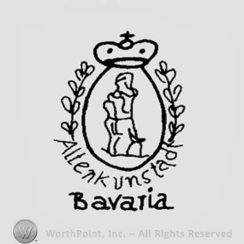 A monolith shape inside an oval with a crown above, the words Altenkunstadt Bavaria under and laurel branches on the sides