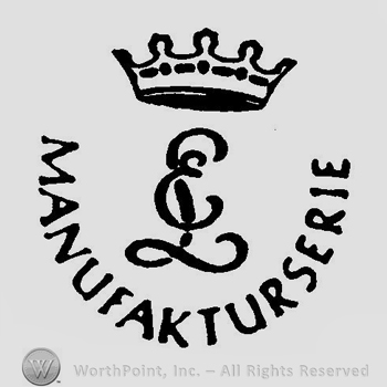 A crown above the letters E L overlapping, surrounded by the word Manufakturserie