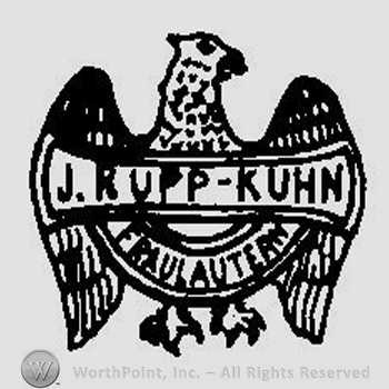 An eagle with spread wings overlapping a half circle with J. Rupp - Kuhn Fraulautern