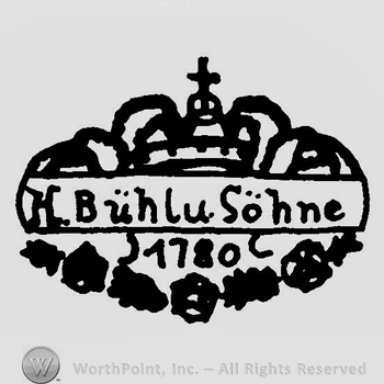 A cartouche with a crown on top and the text H Buhlu Sohne 1780 handwritten inside